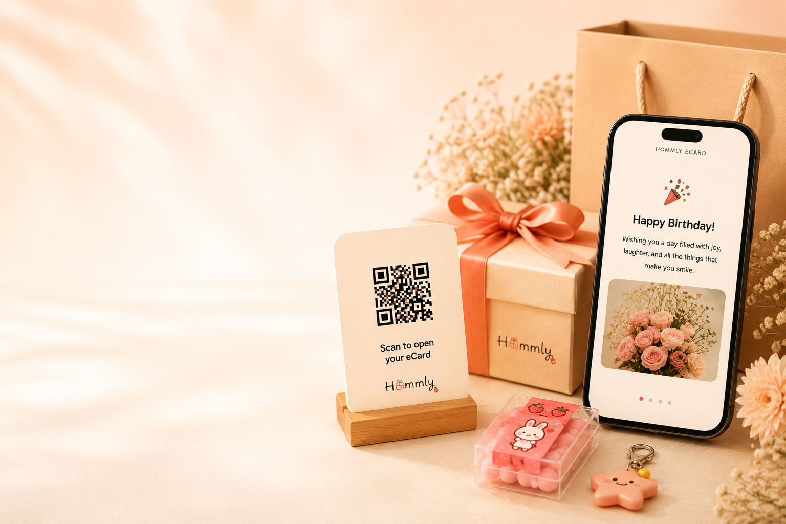 Hommly gift with QR card and phone showing a personalised Hommly eCard